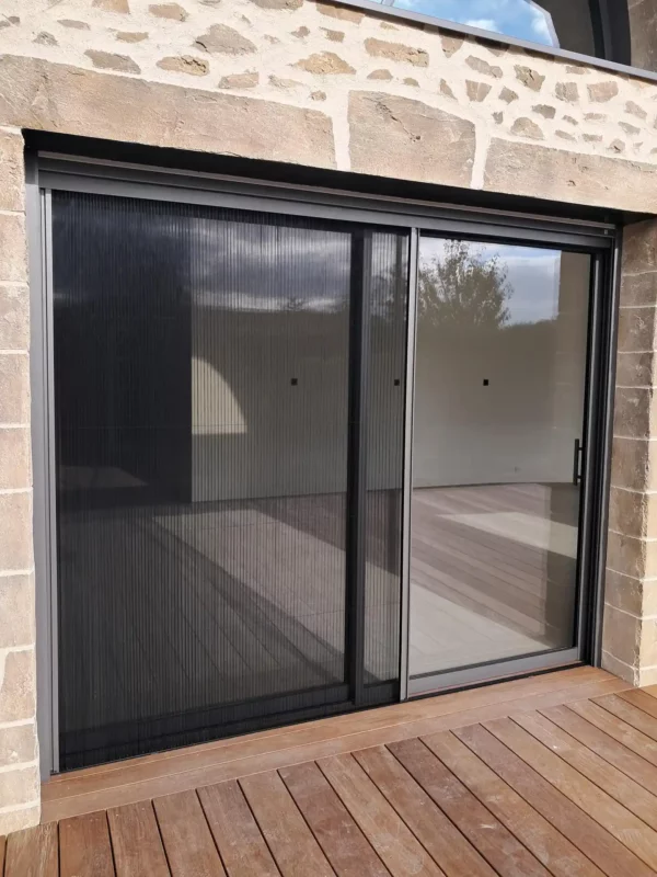 Moustiquaire enroulable latérale